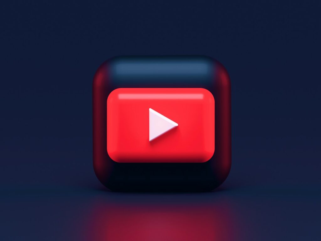 Red play button representing a YouTube channel audit